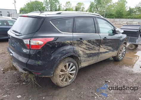 2017 Ford Escape Titanium z USA, uszkodzony, nr VIN 1FMCU9J97HUB65711